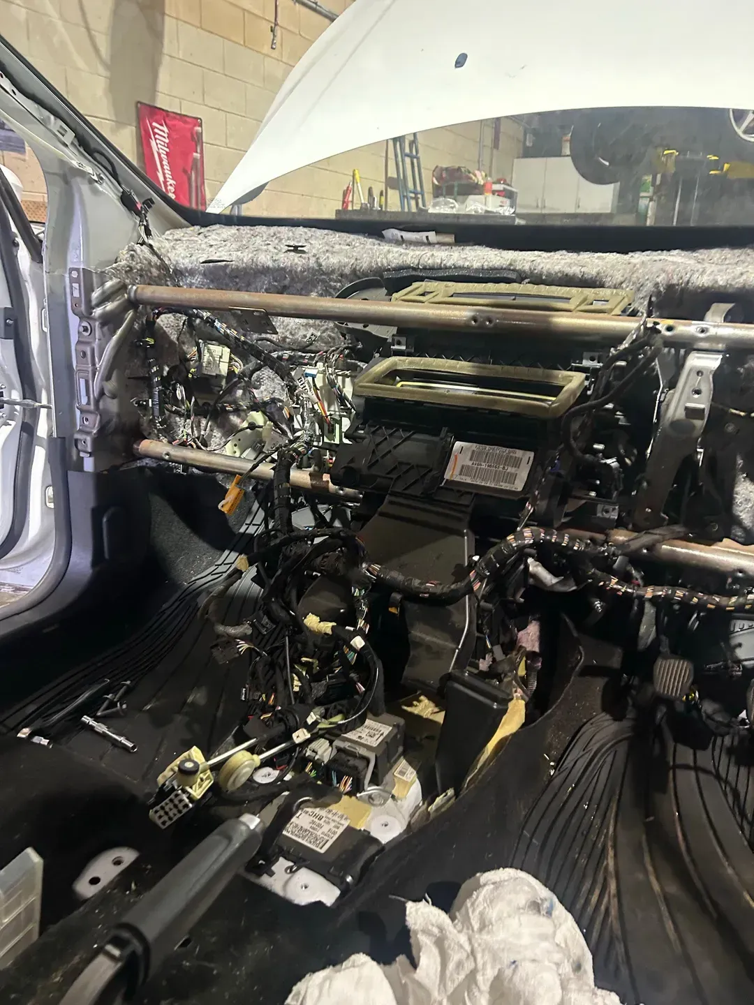 The Interior Of A Car Is Being Dismantled In A Garage — North Geelong Automotive In North Geelong, VIC