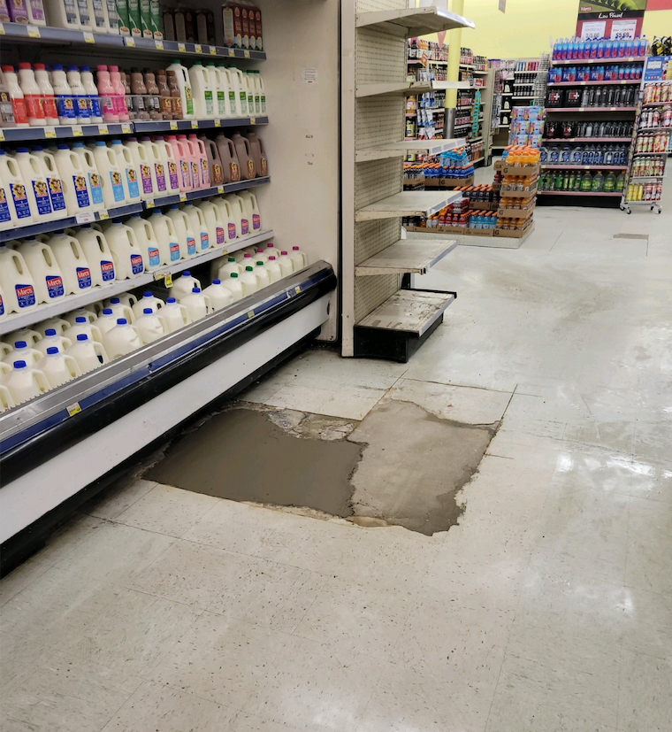 Finished floor at Marcs Grocery store after replacing sewer line.