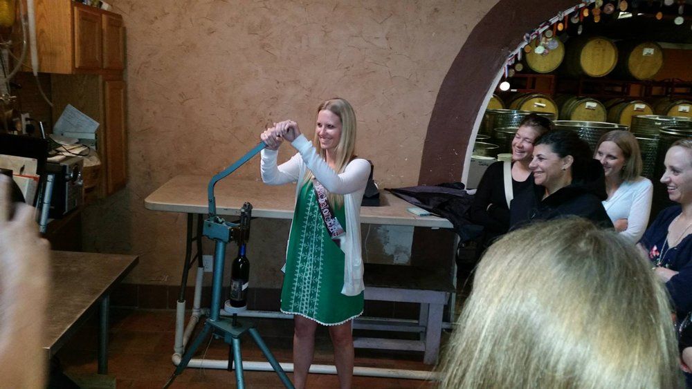 Bachelorette Party  —  Woman Opening a Bottle of Wine in Westville NJ