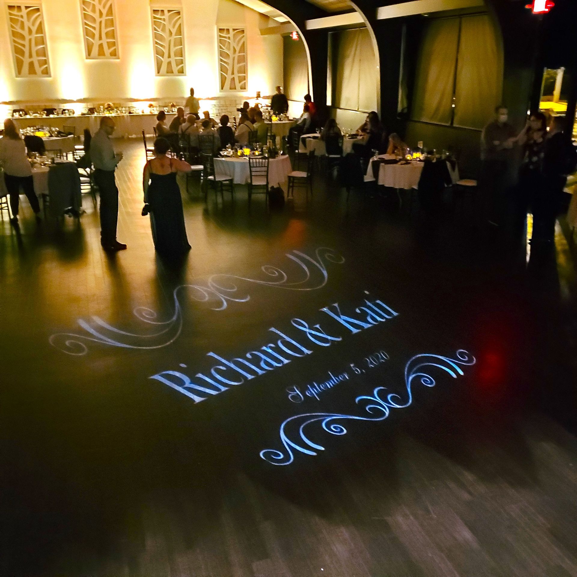 A dance floor with the name richard and kati projected on it