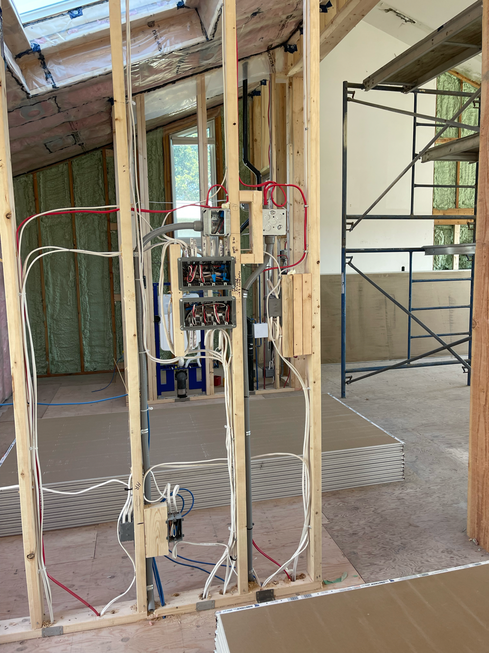 A room with a lot of wires coming out of it
