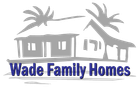 Logo for Wade Family Homes featuring a grey outline of a house with palm trees, with blue text below.