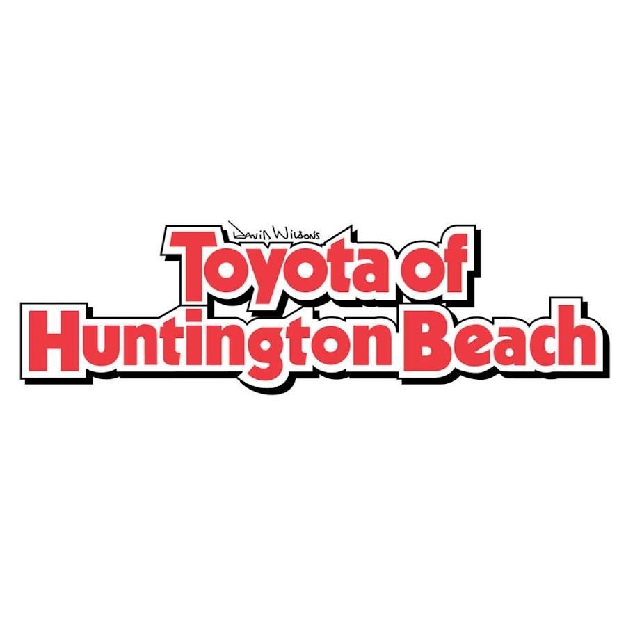 The logo for toyota of huntington beach is red and white.