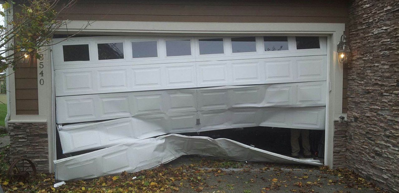 how-to-fix-a-dented-garage-door