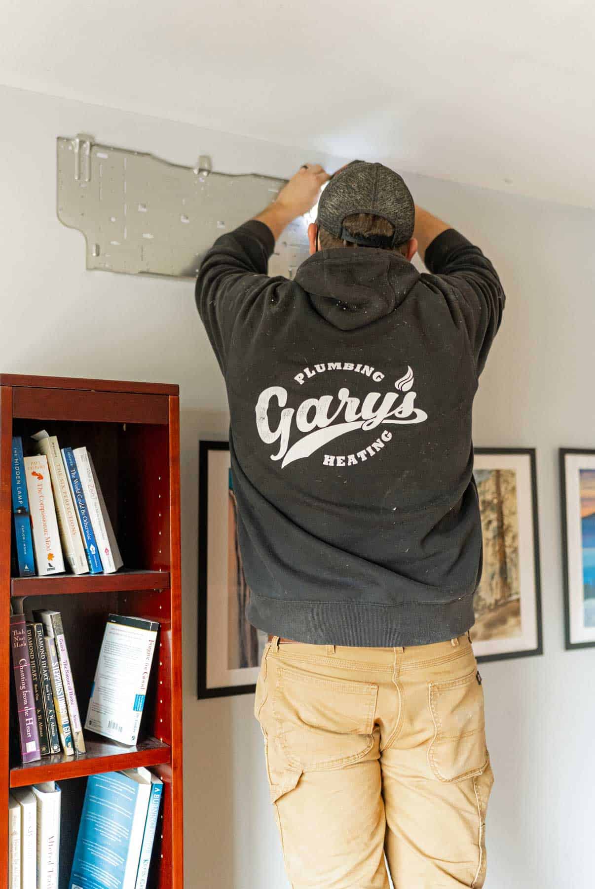 Photo of a technician installing a unit