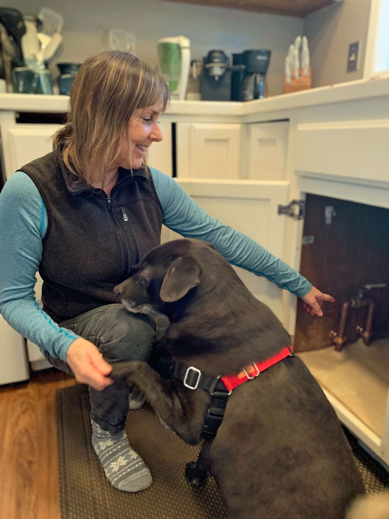 Photo of a woman and dog