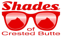 shades of crested butte logo with a pair of red sunglasses