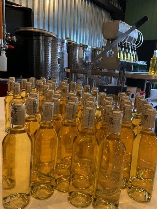 Bottles of Rebel Hive Mead in production