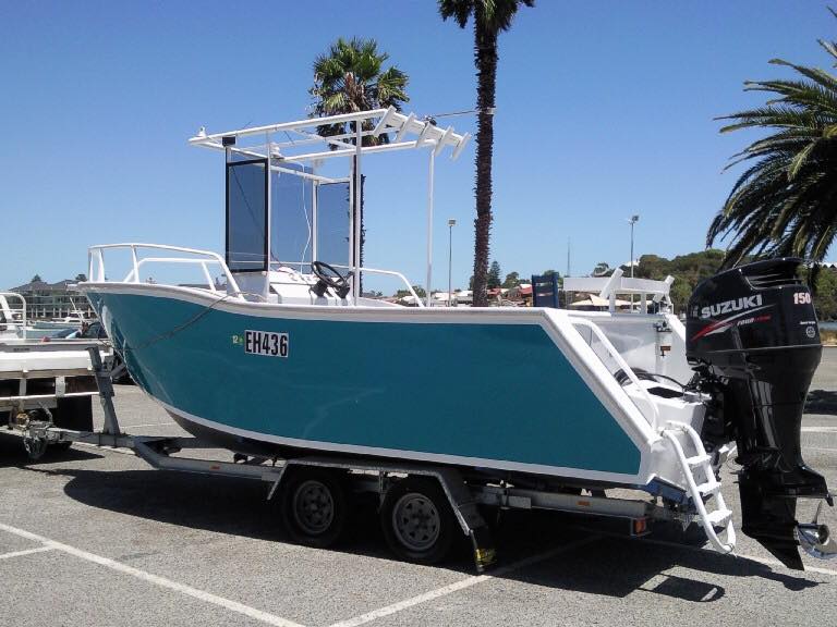 port shot of a boat on top of a trailer