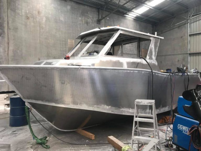 custom boat in progress without paint