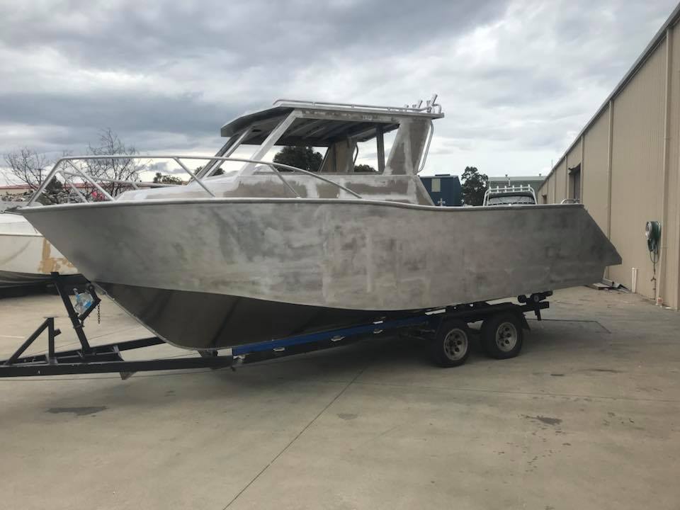 boat without paint sitting on trailer