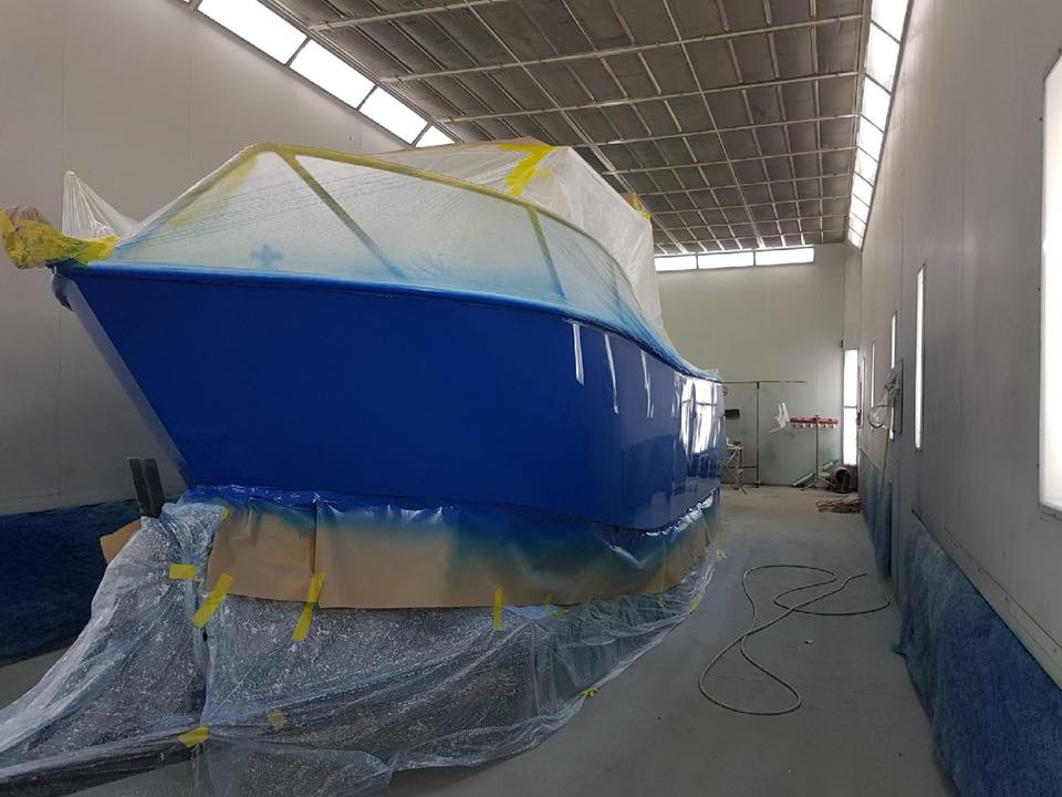 painting of a boat in progress