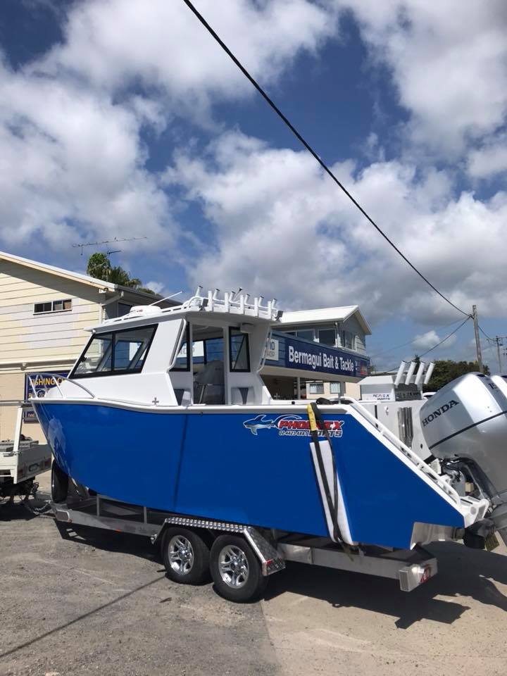 boat sitting on top of a trailer