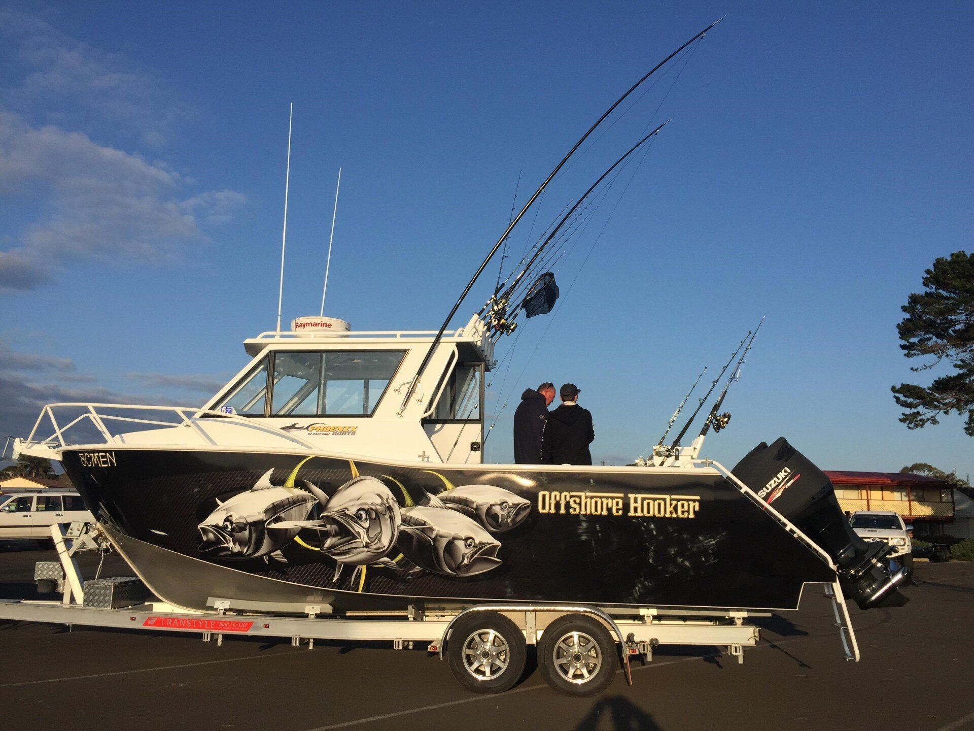 fishers on fishing boat preparing