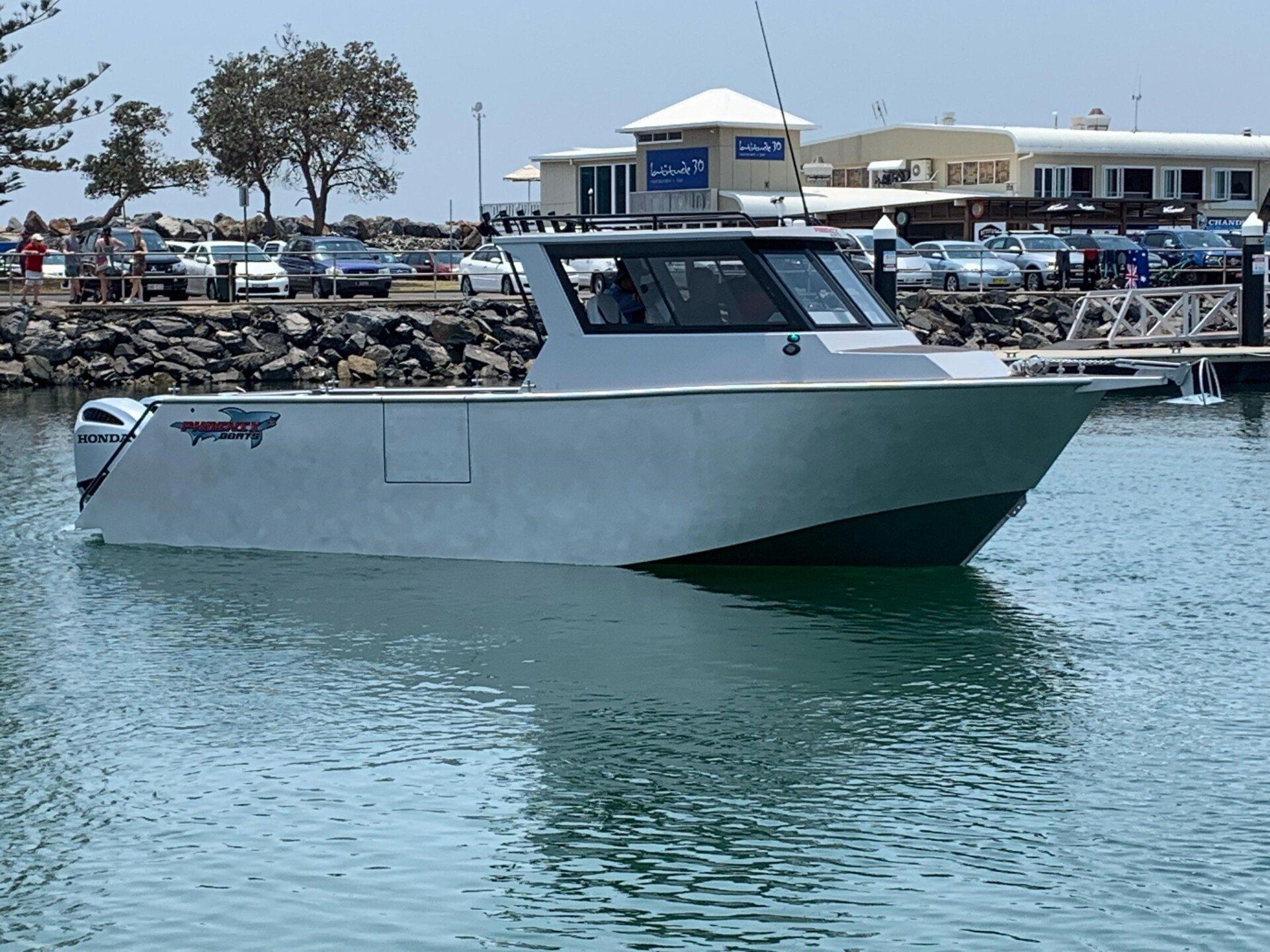 commercial cabin boat on a lake