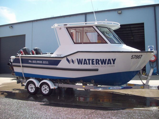 commercial vessel on top of a trailer