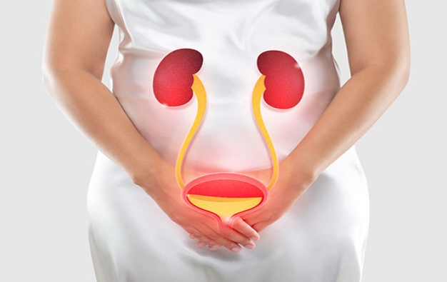 Woman cradles a sleeping baby, softly smiling, near a bright window.