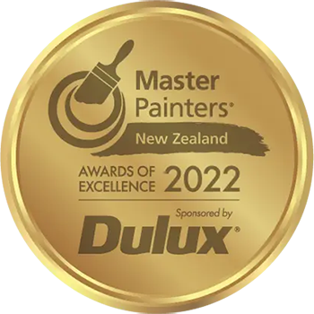 Gold medallion for Master Painters New Zealand Awards of Excellence 2022, sponsored by Dulux; features a paintbrush icon.