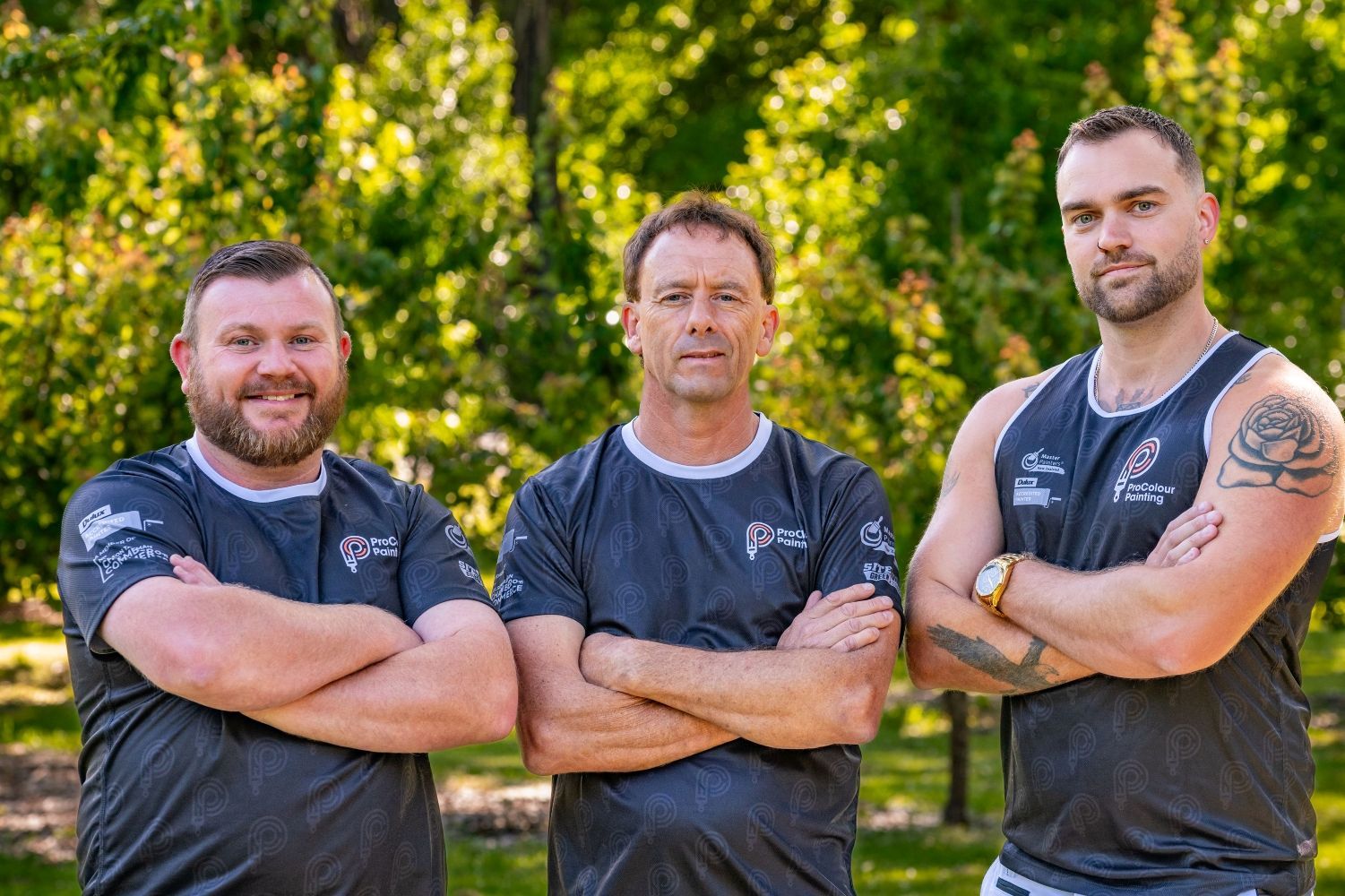 Two-story beige house with an outdoor patio, orange couch, and pool deck, overlooking a landscape.