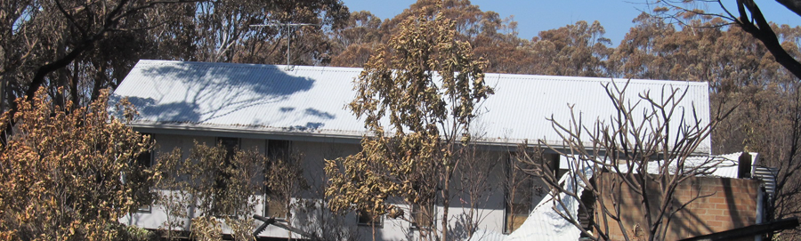 Home damaged by bushfire