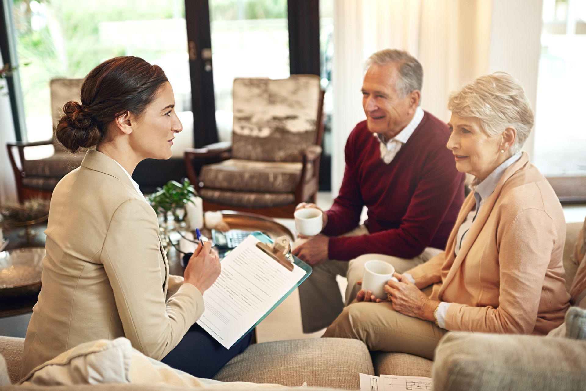 Woman with clipboard discusses documents