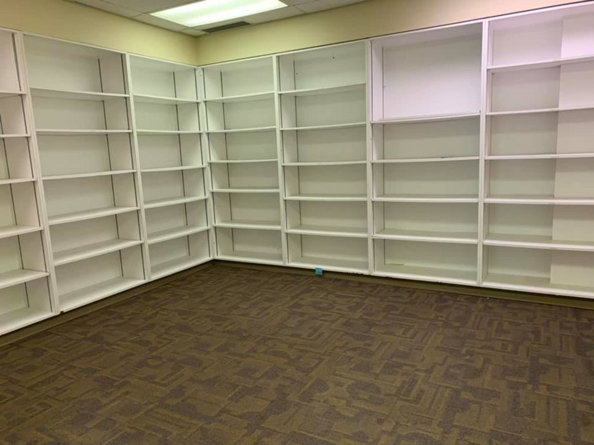 Empty office shelving after commercial cleaning in Calgary