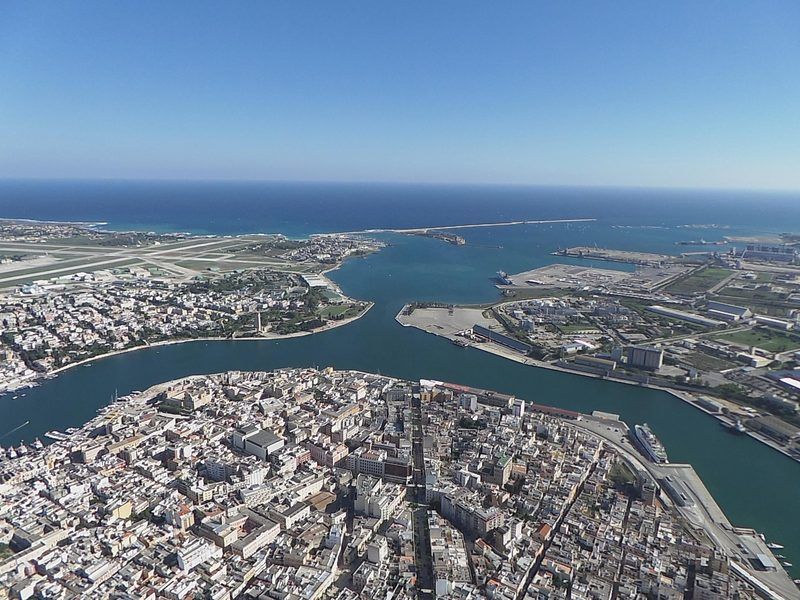 An aerial view of a city with a river running through it.