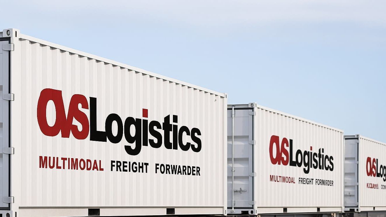 An aerial view of a train yard filled with lots of train cars.