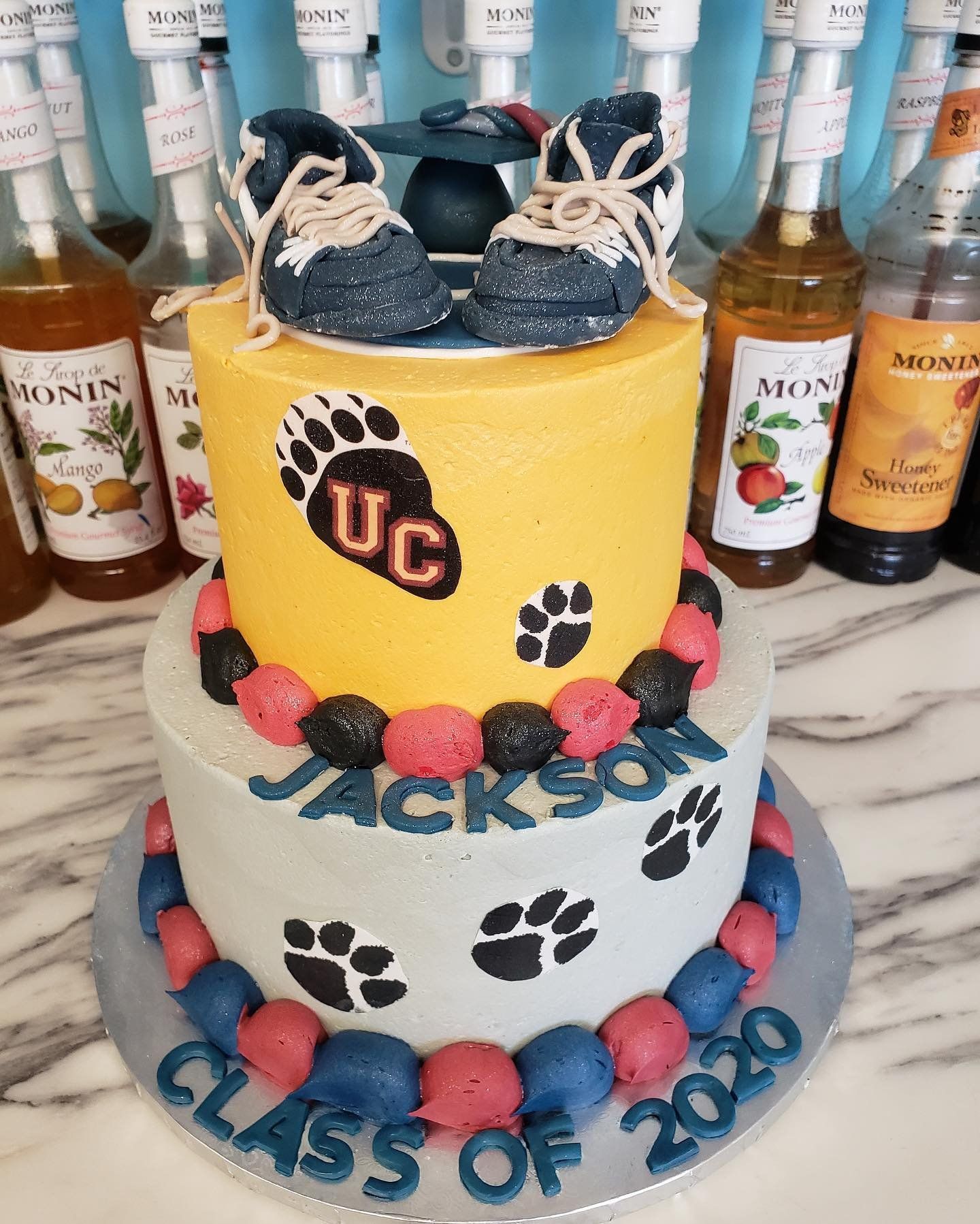 A cake that says jackson class of 2020 on it