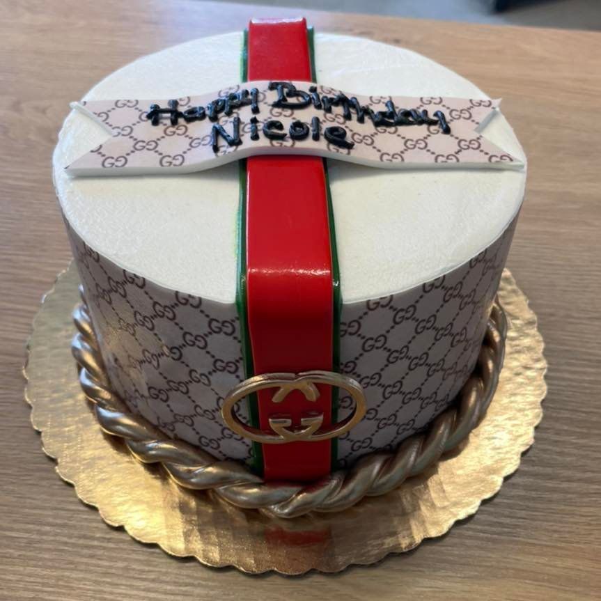 A birthday cake with the name nicole on it