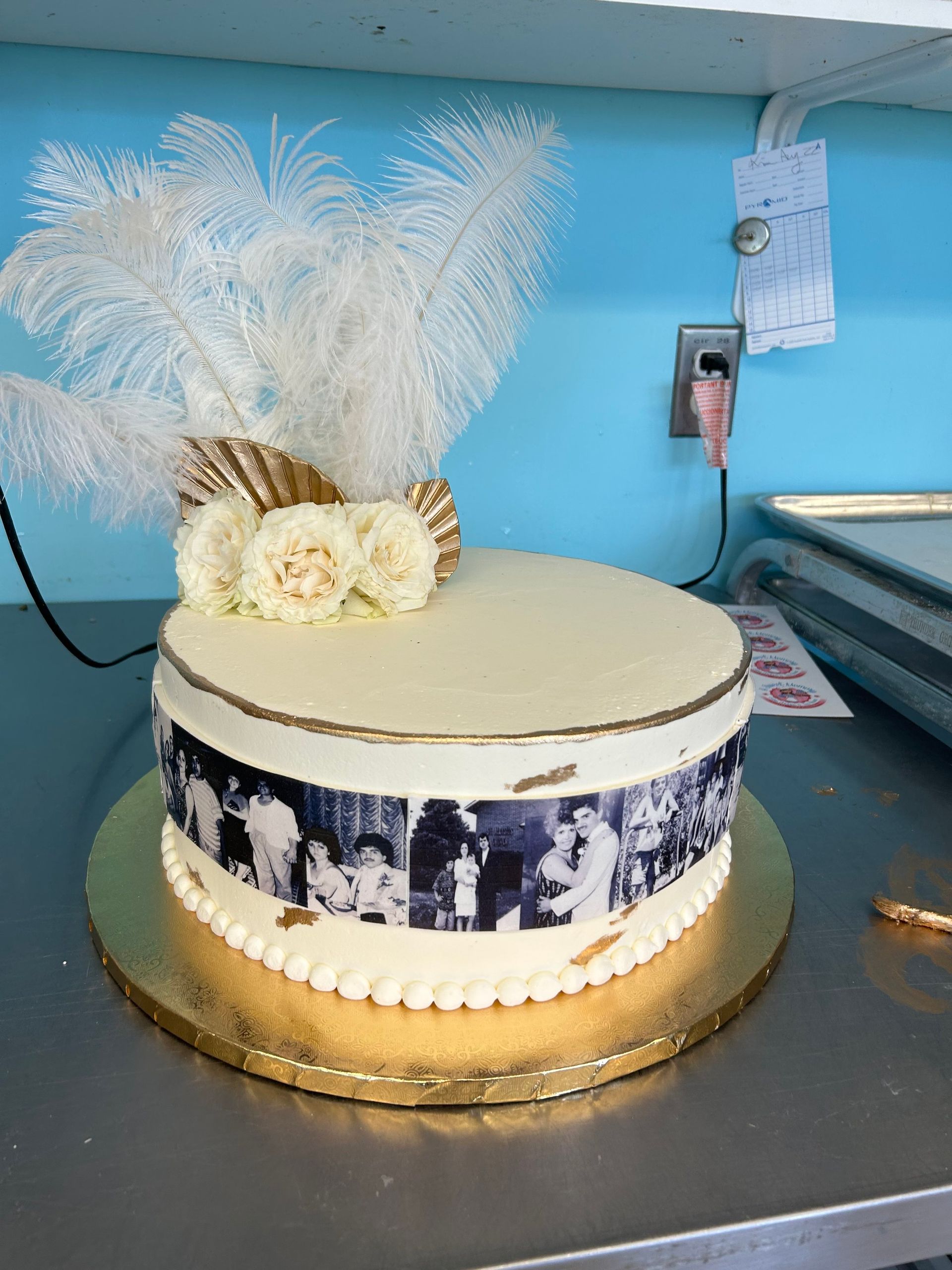 A cake with an ostrich feather on top of it
