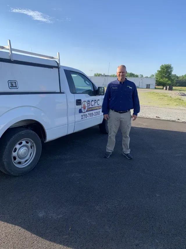 Man Beside The Car | Elizabethtown, KY | BCPC Exterminating