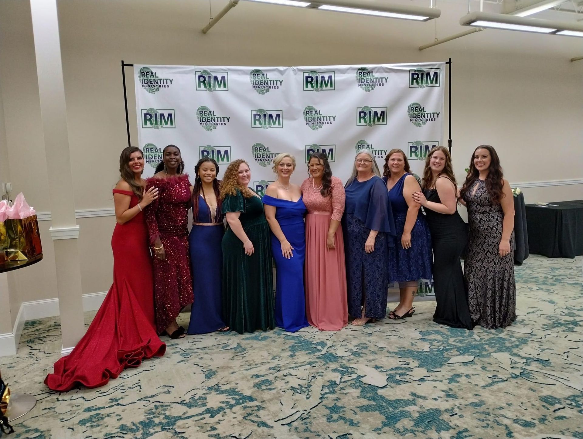 Real Identity Ministries sober soiree event photo shoot - group of women by the photo wall