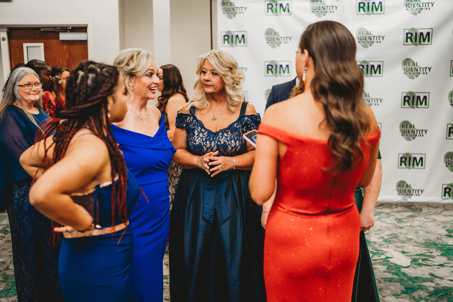 Real Identity Ministries sober soiree event photo shoot - group talking at the event