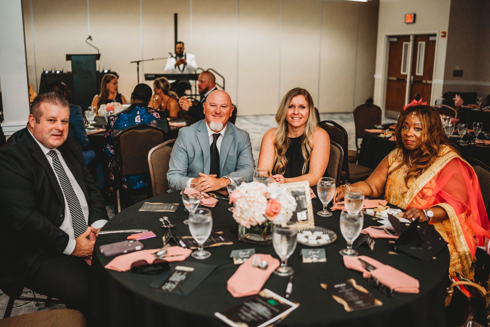 Real Identity Ministries sober soiree event photo shoot - group seated together at the dinner table