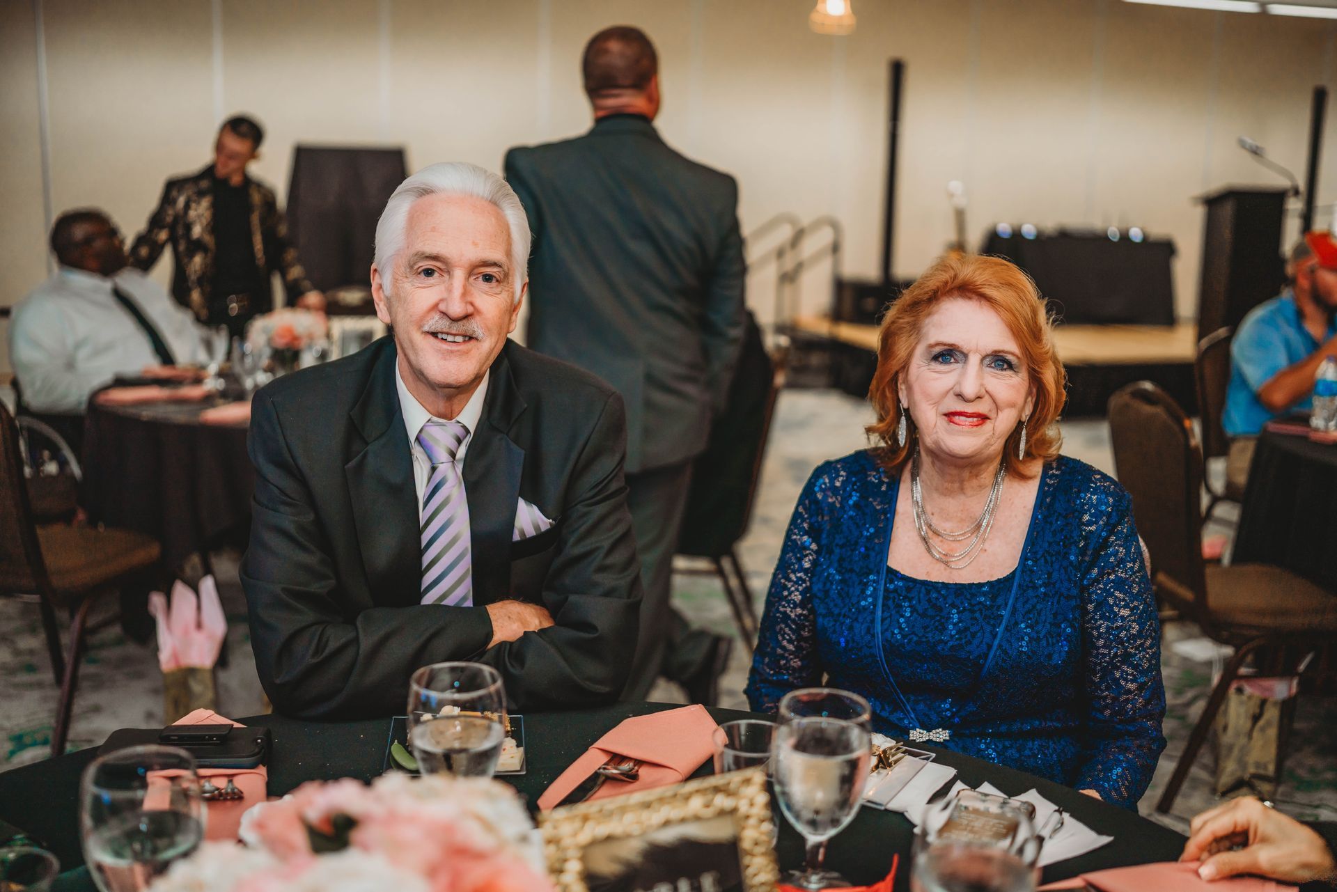 Real Identity Ministries sober soiree event photo shoot - couple seated together at the dinner table