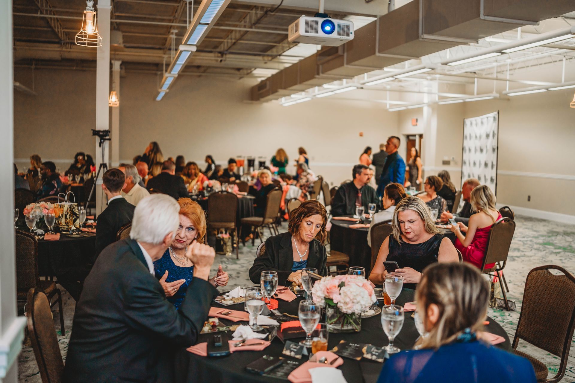 Real Identity Ministries sober soiree event photo shoot - view of people sitting at event tables