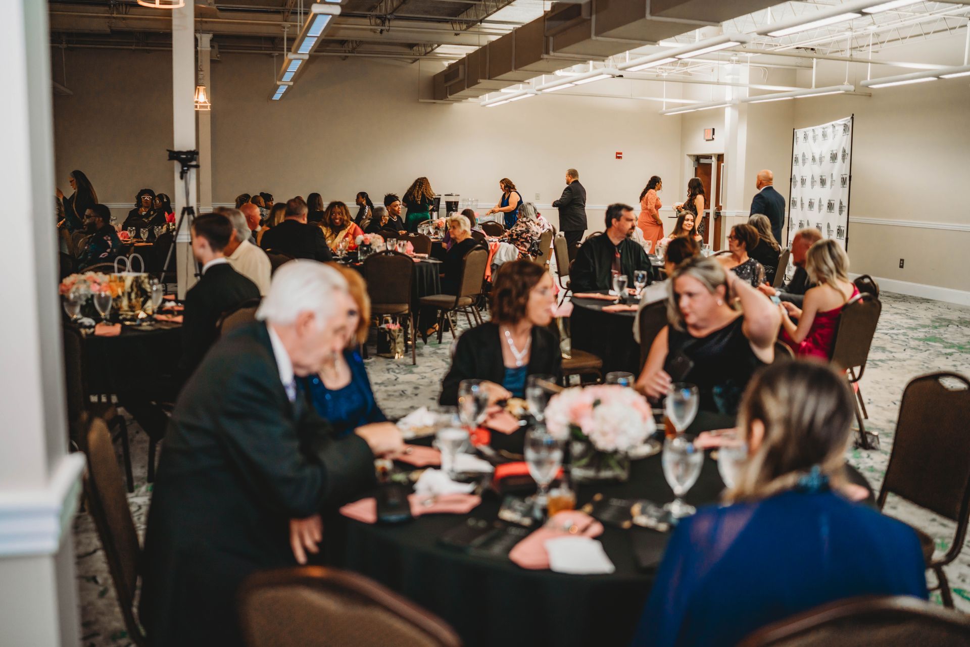 Real Identity Ministries sober soiree event photo shoot - group seated together at the dinner table