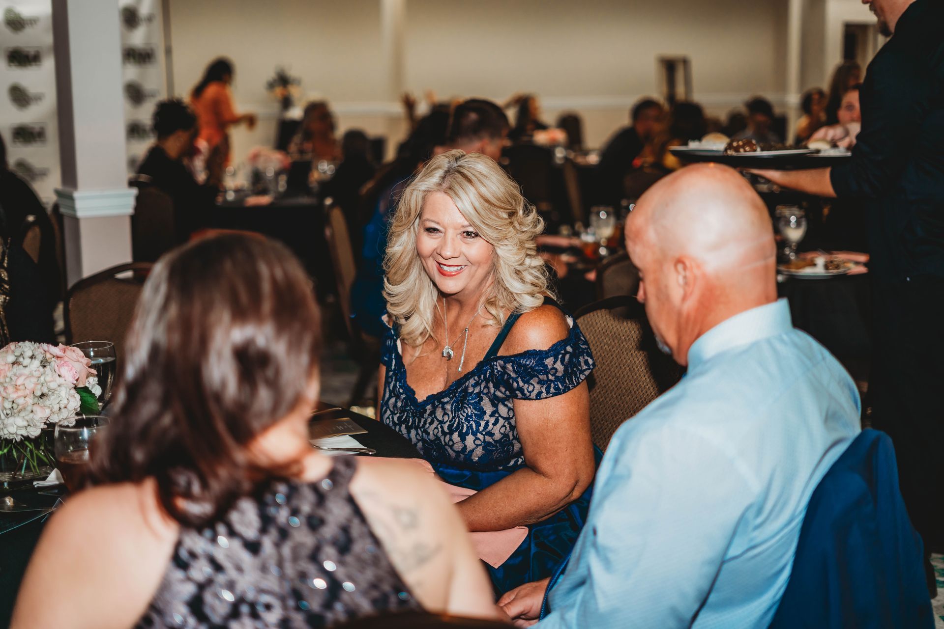 Real Identity Ministries sober soiree event photo shoot - group seated together at the dinner table