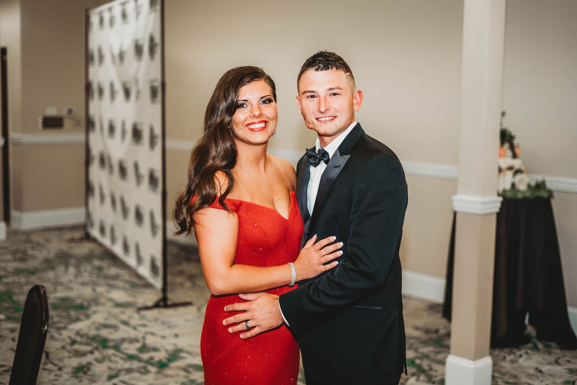 Real Identity Ministries sober soiree event photo shoot - young couple posing for photos at the event