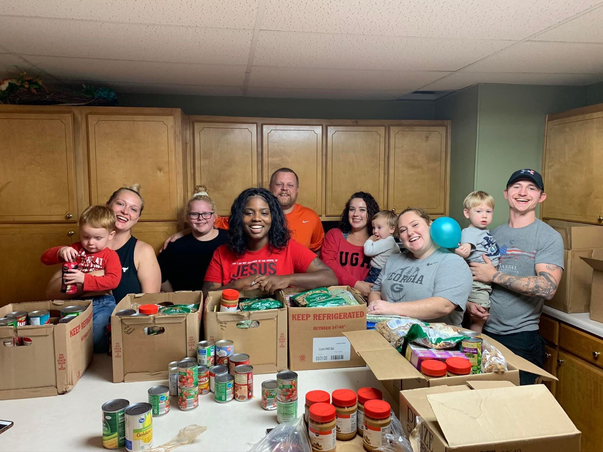 Real Identity Ministries - group of people packing boxes of food