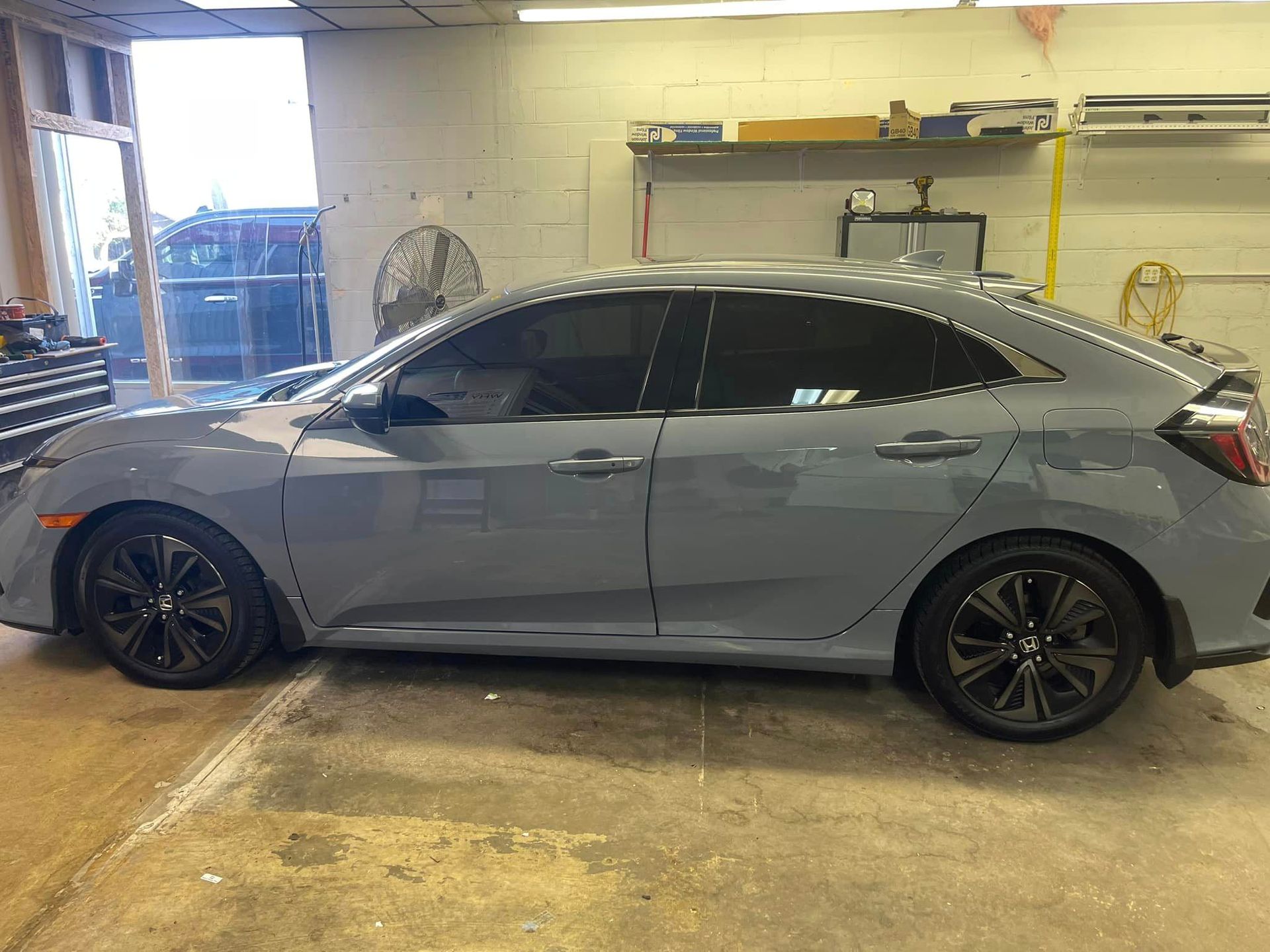 A Gray Honda Civic Is Parked in A Garage | Wichita, KS | ICT Pros Window