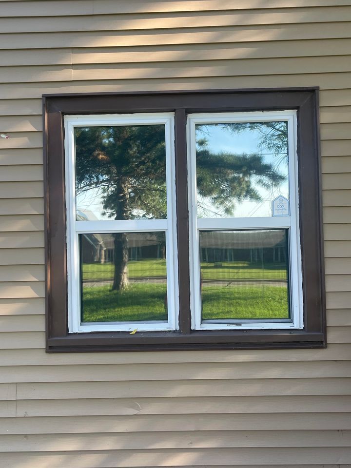 A Window on The Side of A House with A Tree Reflected in The Window | Wichita, KS | ICT Pros Window