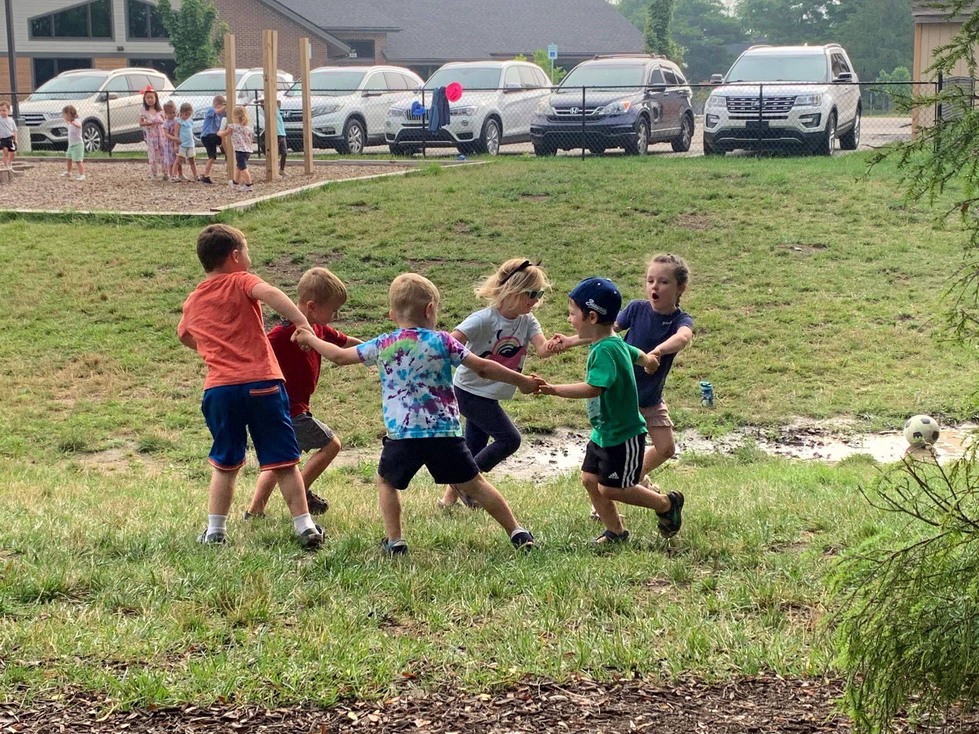 IMA children play, Ring Around the Rosie.