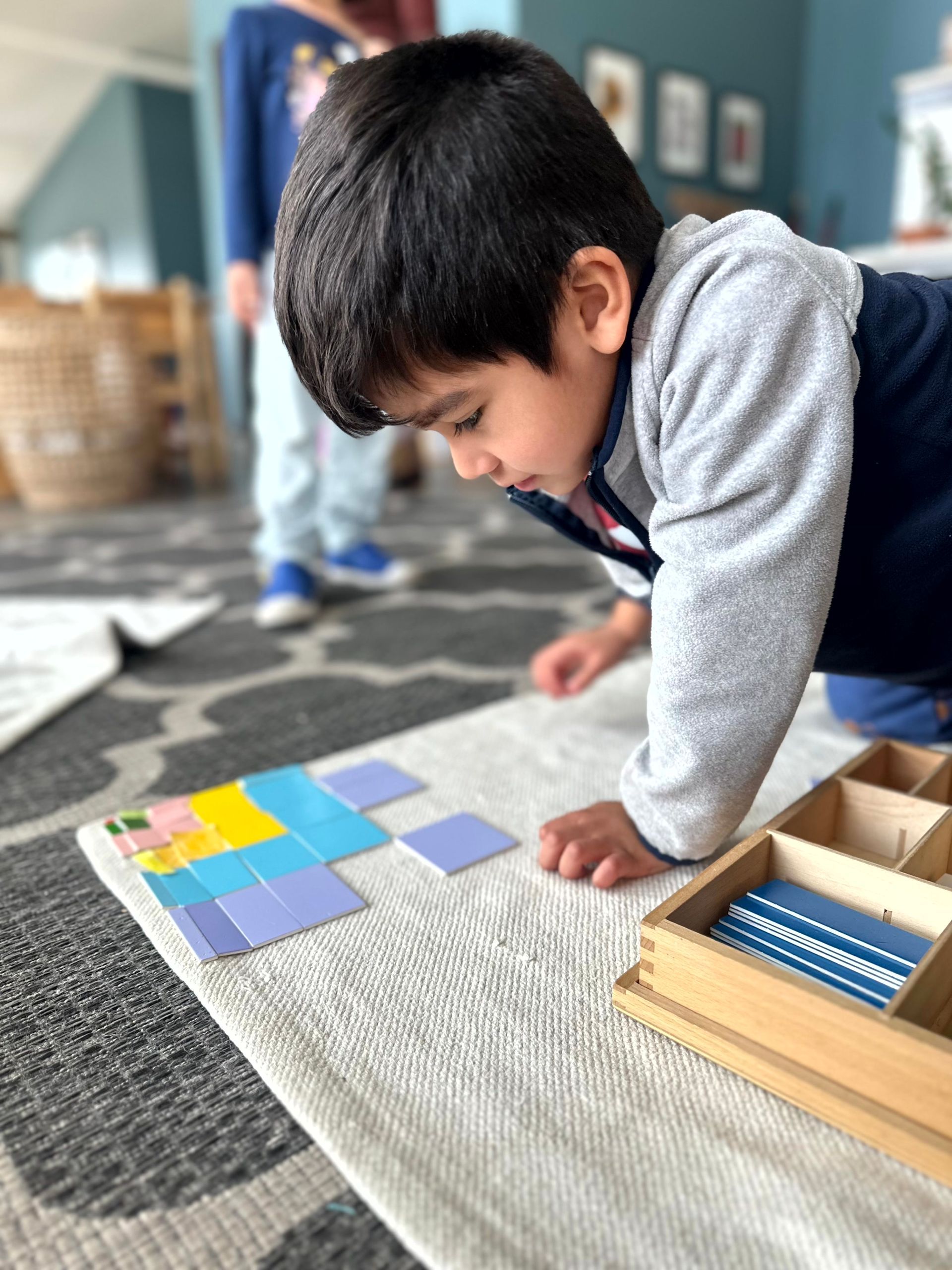 An IMA student builds the Decanomial Square.