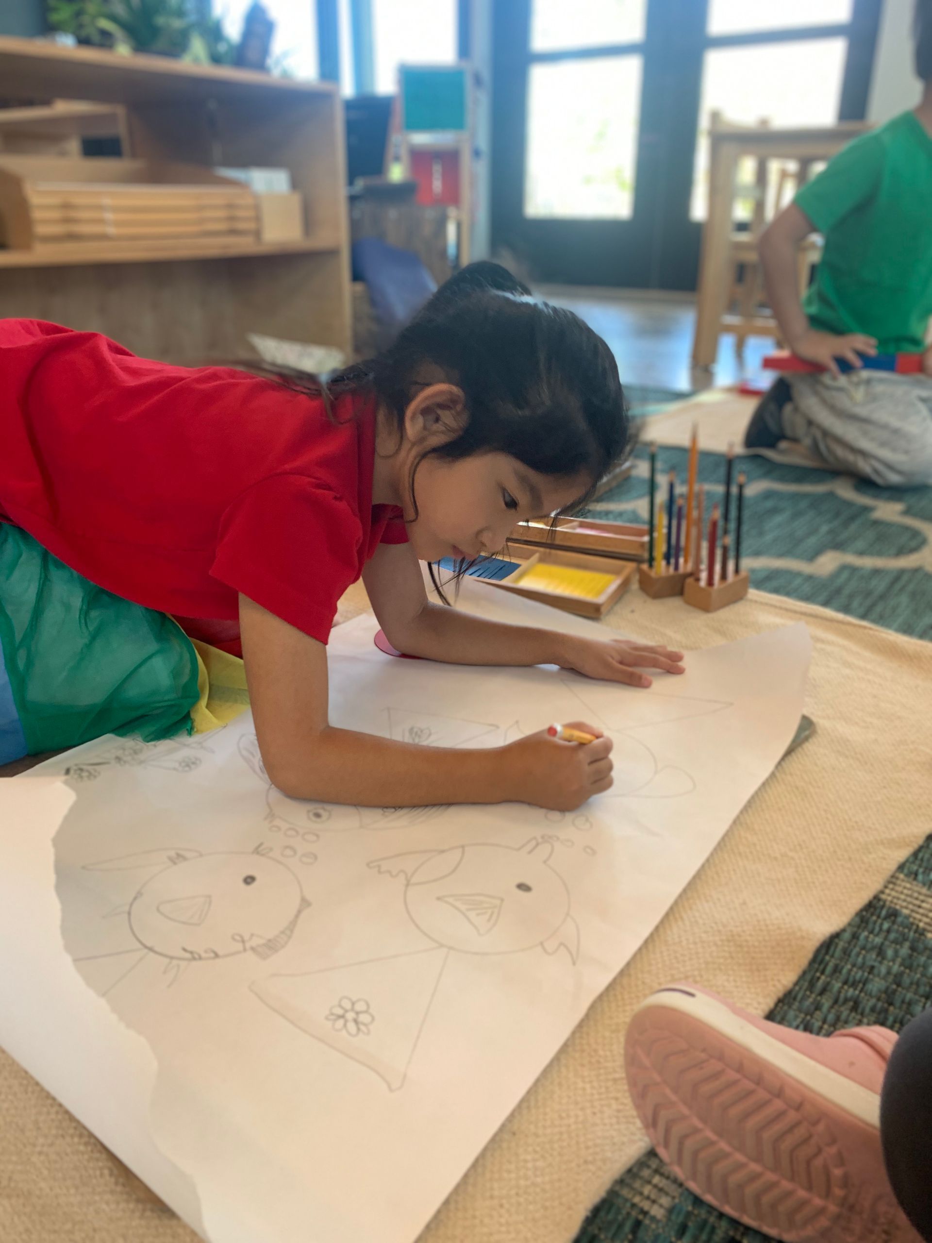 An IMA student creates designs with the Geometric Figures. 