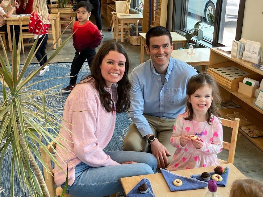 An IMA family attends our annual Valentine's Tea Party.