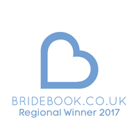 The logo for bridebook.co.uk is a blue heart. Eddie young magic wedding magic entertainment