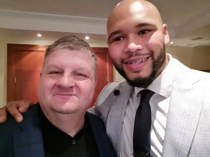 Two men in suits and ties are posing for a picture.Frazer clarke boxer and eddie young