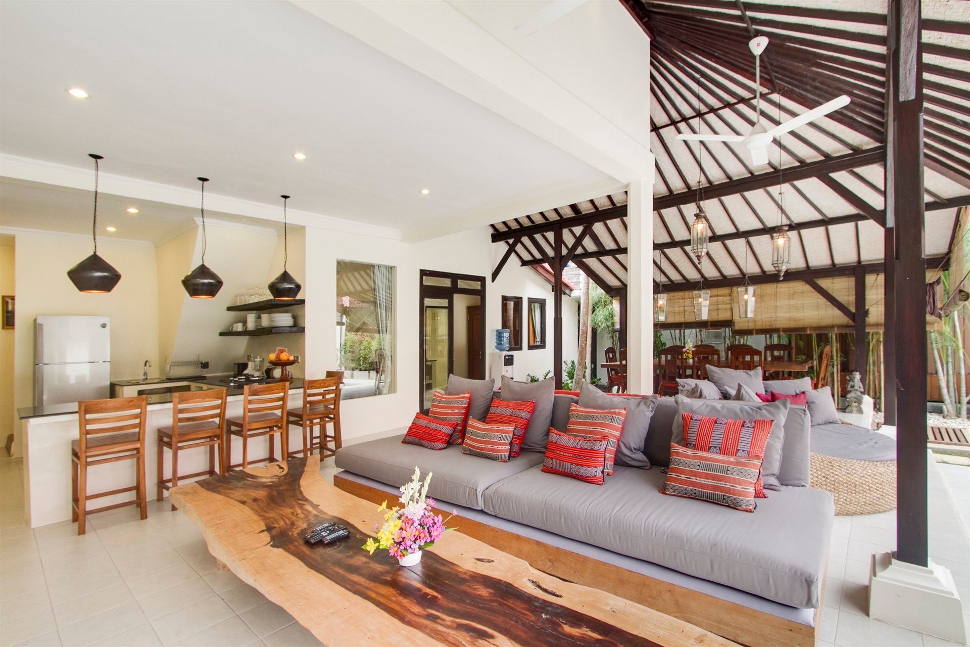 A living room with a couch and a wooden table